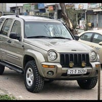 جيپ لیبێرتی 2004 بدون صبغ دبل أكسل (4x4)  سيارة قوية و نضيفة المحرك: 6...