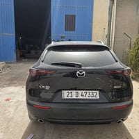 مازدا • CX-30 • مازدا CX-30 • سيارة • مركبة • موديل 2023 • بدون صبغ • ...