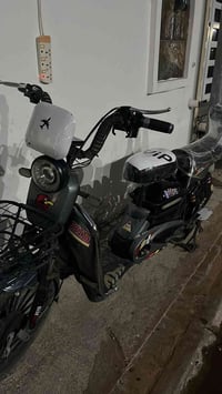 دراجه شحن • تبديل بطاريات • فلوجه