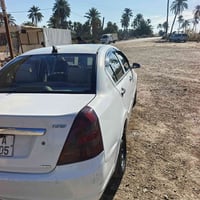 ٢٠١٣ • كير عادي • شاشة وكاميرا