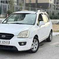كيا كارينزا 2009 خليجي ماشيه 160 7 راكــب رقم انكليزي بغداد  محرك 2000...