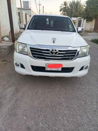 تويوتا ٢٠١٤ • ماشيه ١٩٠٠٠٠ • رقم بغداد باسمي