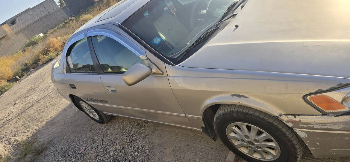 السلام عليكم سياره كامري وارد امريكي رقم بغداد تدفئه تبريد كير ومحرك خير من الله نضيفه تحويل مباشر 65 وبيها مجال  للاستفسار ***********  صلاح الدين بلد
