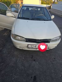 بروتون ٢٠٠٤ نظيف محرك ستندر  تحويل ثاني يوم  رقم بغداد انكليزي   هزة ق...