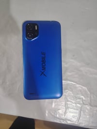 اكس موبايل • ٣٢ جيجا • جديد كامل اغراض