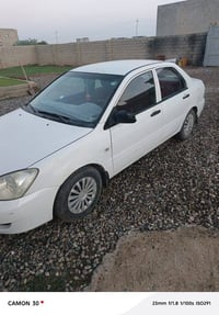 مشتبوشي لانسر 2009 موديل سنويه منتهيه بل شهر ارابع مسجله ابسمي رقم ارب...