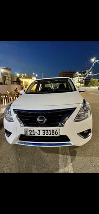 نيسان سني موديل2023  بيها باب قطعة صبغ وشبر من باب السكن من جوه  وجامل...