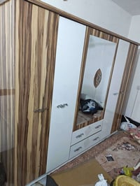 ميز طعام • عربانة طفل • براميل نفط