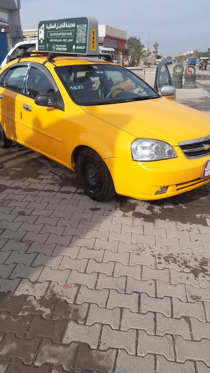 $60أوبترا موديل 2005 مشروع وطني سنويه جديده الى ٢٠٢٩ شرط تحويل والوكاله بيها كوبون بنزين  سيارة بيها منضومة غاز  نقابه دينار ما مطلوب مصفرة تبريد شغال ثلج  تتفئه شغال  كهربائيه كولها مضبوط وشغال محرك  كير  شرط  بدون  حادث بدون ضرر فقط باب خلف سائق مبدل بلادي سيارة  بيها تصفيه  معجون  فقط  عنوان كركوك  ١٦  أب  للأستفسار أتصل  /***********  بيها وتساب ..
