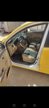 اخوان كيا ريو موديل ٢٠١٢ محرك ١٦ هيئه ١٥٠ الف عليها غرامات ١٠٠الف دينا...
