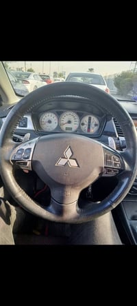 دركة لانسر بومه كامله جيب وشد القديم السعر 100 الف مكاني الكرخ 0770295...