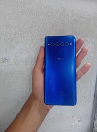 جهاز TCL10plus اذكره 256 رام،6جهاز كلو شغلات شرط شاشه مسطحه بصمه بشاشه...