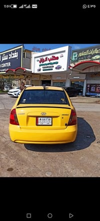 سيارة اكسن للبيع موديل 2010 كير توماتيك جامات كهرب بيها ضرر بالبوند شب...