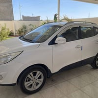 توسان ٢٠١٣ • محرك ٢٠٠٠ • رقم بغداد الدولي