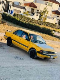 مازدا 323 • موديل ١٩٩٥ • كركوك سر جنار