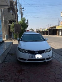 سيراتو 2012 عميه  رقم بغداد انكليزي مكينه وكير مكفولات  كهربائيات كلها...
