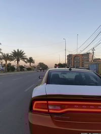 جارجر 2011سياره كلين لون مشمشي مميز جاهزه تخم تاير كير مكينه كله جديده...