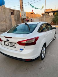 فورد امريكي موديل 2013رقم بغداد بسمي السعر 68وبيه مجال العنوان واسط ال...