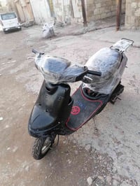 دراجة كهربائية • ١٢٥