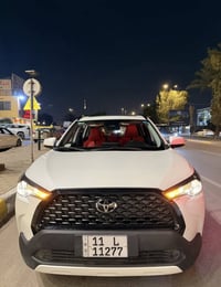 كورلا كروز للبيع 2025 ماشية 3000 رقم بغداد بأسمي  السياره كفاله عامه م...