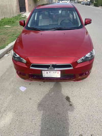 لانسر ٢٠١٦ ماشية ٤٩ الف  مكفولة من البارد والصبغ  بيه ملاحظات موضحة بل...