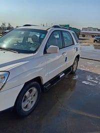 كيا سبورتج. ٢٠٠٩ رقم كركوك خليجي. كلين.......07823450345