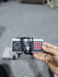 جهاز ألعاب • ٦٢٠ لعبة • ملحقات