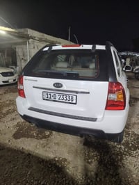 للبيع سبورتج موديل  2010 كفاله عام رقم بغداد لون ابيض تحويل مباشر للاس...