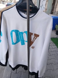 تصفية محل • ملابس رجالي • النجف حي العداله