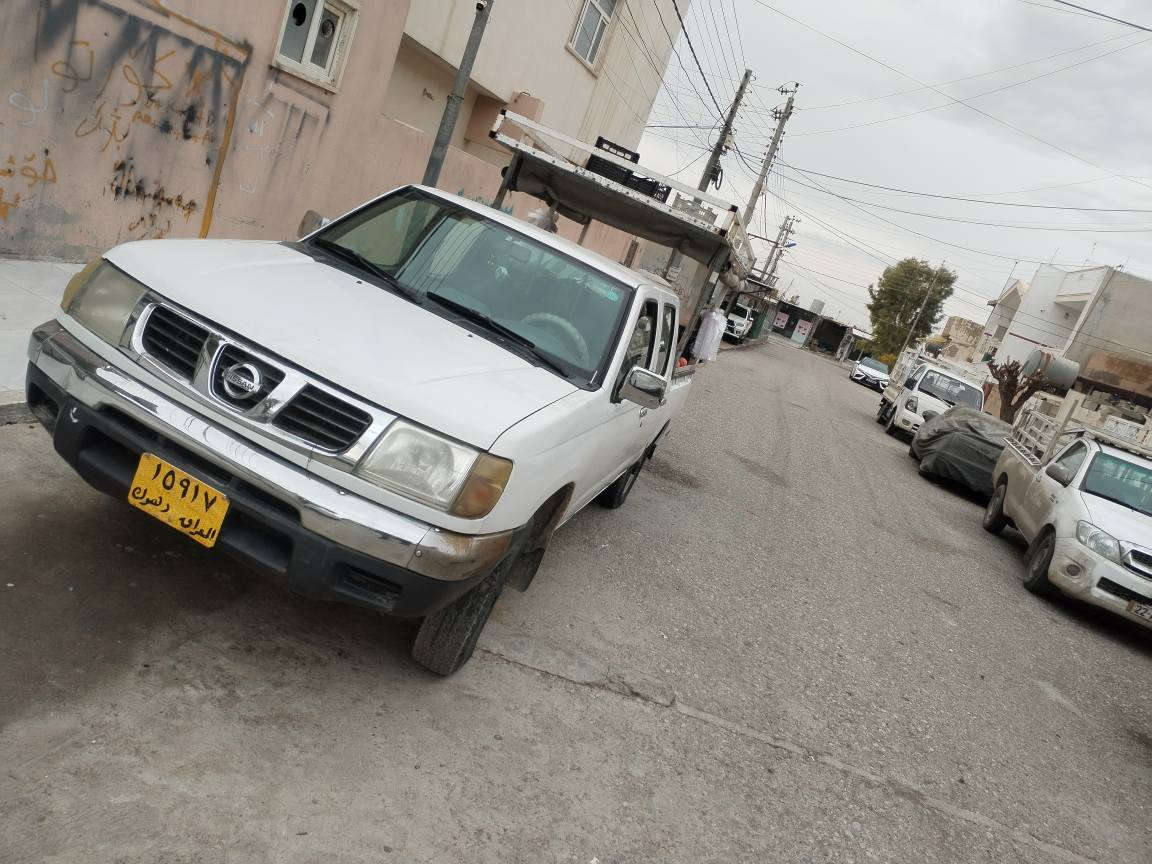 ‎پیکاب نیسان 2002 تەبرید پاوەر تەقەورەقە بەشەرت***********‎ أربيل, العراق
