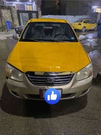 كيه اسبكترا 2009  محرك 2000 دوش رقم دياله   صدر نص عمر تبريد كبريسر ما...