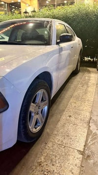 دوج جارجر موديل 2010 اصل خليجي كفاله عامه مزاد وزاره الداخليه وكاله ام...