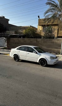 اوبترا البيع موديل 2004 رقم بغداد انكليزي سياره حلوه ونضيفه بيها شويه ...