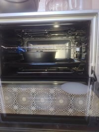 اوفن جديد مستخدم سبوع فقط السعر100 ألف وبي مجال رقم التواصل07736051584