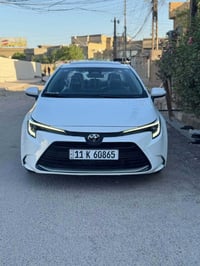 كورلا هايبرد موديل 2025 للبيع ماشيه ٢٢ الف السياره بسمي بغداد فول مواص...