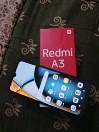 ردمي A3 • ١٢٨ • ظهر متشقق