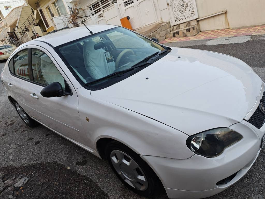 پڕۆتۆن ٢٠٠٩ 
سەیارەکە زۆر مەزبوتو بێ تەقەوڕەقەیە 
٤تایەی تازەی لەژێرایە گێڕو مەکینەو تەقەوڕەقە بەشەرت
سەنەوی و ڕەقەموهەموشتێکی تازەیە 
٣ پارچەی بۆیاخە 
سەیارەکە بەس ماشەڵای ئەوێ 
سعری ٥٧ گەڵا
*********** السليمانية, العراق
