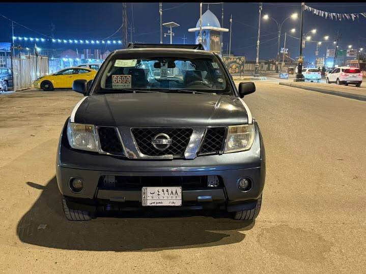نيسان بافندر موديل 2007 رقم بغداد سنويه جديده مشروع وطني سياره وارد امريكي حادثها باب سايق معمر وبيه البنيد جارد وصبغته لباقي كفاله سياره جاهزه كير مكينه حداديه تخم تاير غاز بانزين سبعه راكب سياره مال جناي سعر 82 وبيها مجال بسيط *********** المجر الكعبي, ميسان
