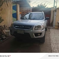 سياره سبورتج مديل 2009 بيهه جاملغ مبدل وصبغ بالباب سياره جاهزه من كلشي...