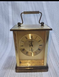 ساعة انكليزي • نحاس • شغالة