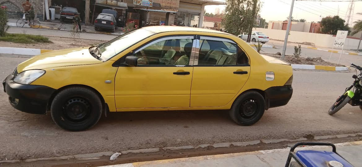 لانسر رقم ديالى ٢٠١٠ بيه طخه الخشم البنيد وبيه بلبك لايت طخه بدون ضرر سعرر ٦٣ وبيه مجال مكان ديالى الويجهيه 
***********
