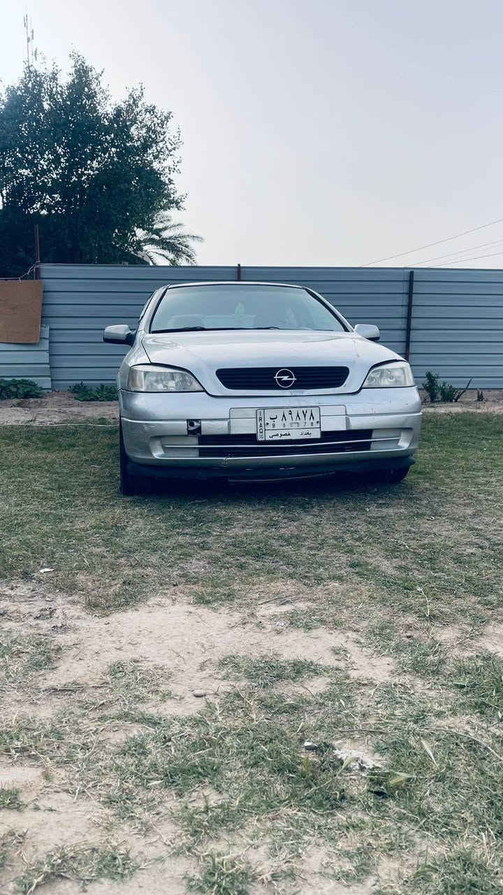 البيع استرا موديل 2002رقم بغداد سياره جديده وجاهزه بدون نغص بدون صبغ بيه شويه جراد بس مكاني بغداد المحموديه ***********//***********
