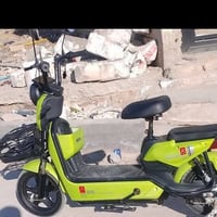 دراجة كهربائية • سكوتر كهربائي