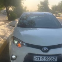 للبيع  كورلا موديل 2014 وارد امريكي  لون ابيض  رقم بغداد  سنويه بإسمي ...
