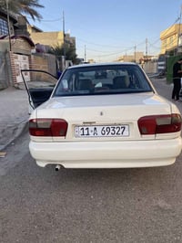 بروتون • ٢٠٠٥ • باسمي