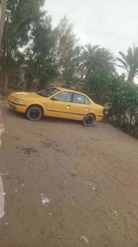 عندي سيارة سمند اريد راوسه ب كيه بسته 07836297313