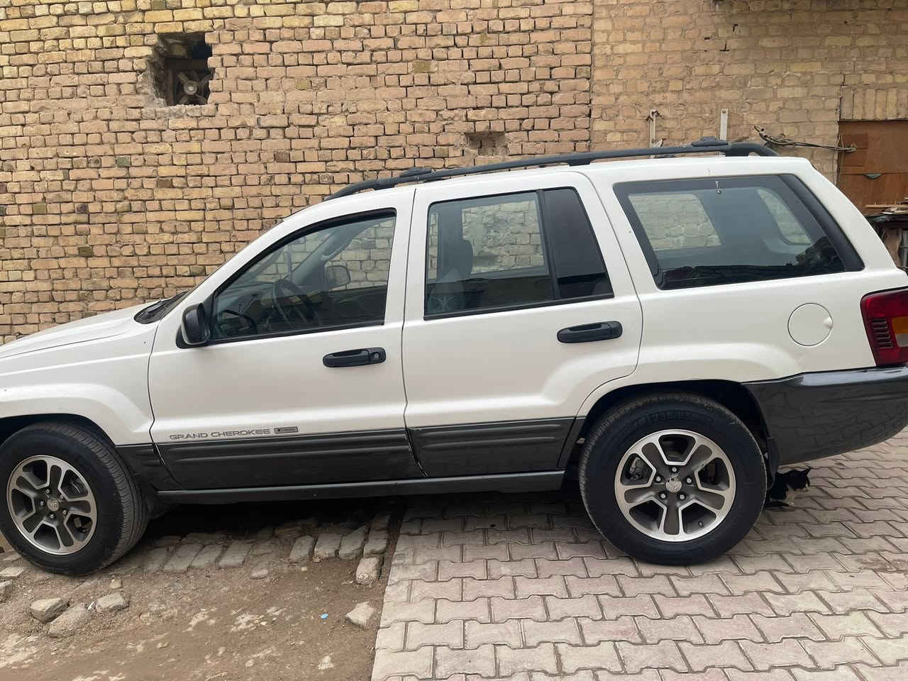 جيب شيروكي ٢٠٠٤ بلادي بسمي السيارة السعر ٦٤ رقم بغداد إنكليزي ***********اتصل
