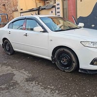 اوبتيما • ٢٠٠٠ • رقم بغداد