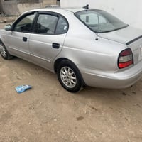 دايو لكنزه موديل 2000 محرك2000كير اوتو  سلايت ررف شغال صدرجديد تخم تاي...