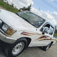 تويوتا ياباني • ٢٠٠٢ • ابيض